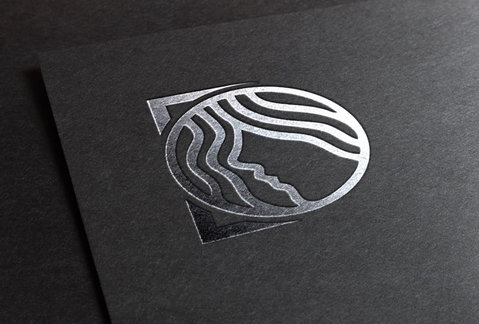 The Dreadit mark silver-foil stamped on dark textured card