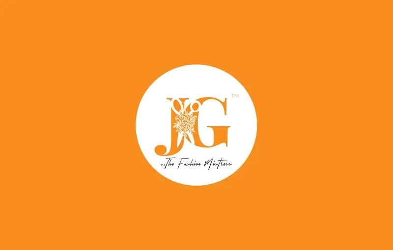 Jane G Fashion Empire brand guide cover: JG monogram with scissors and roses in a white circle on orange