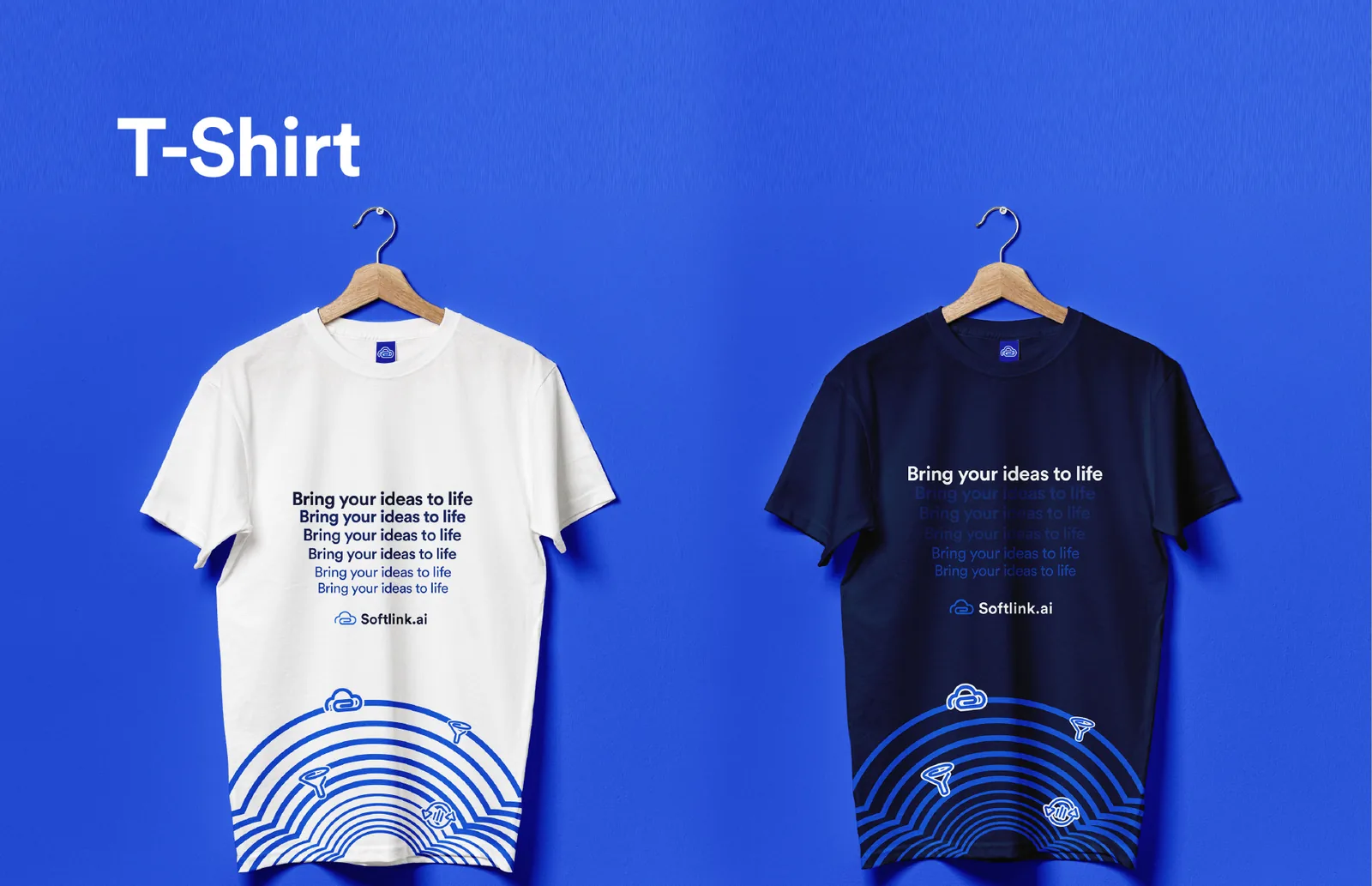White and navy Softlink.ai T-shirts on hangers, slogan stack on the chest and concentric arcs on the hem